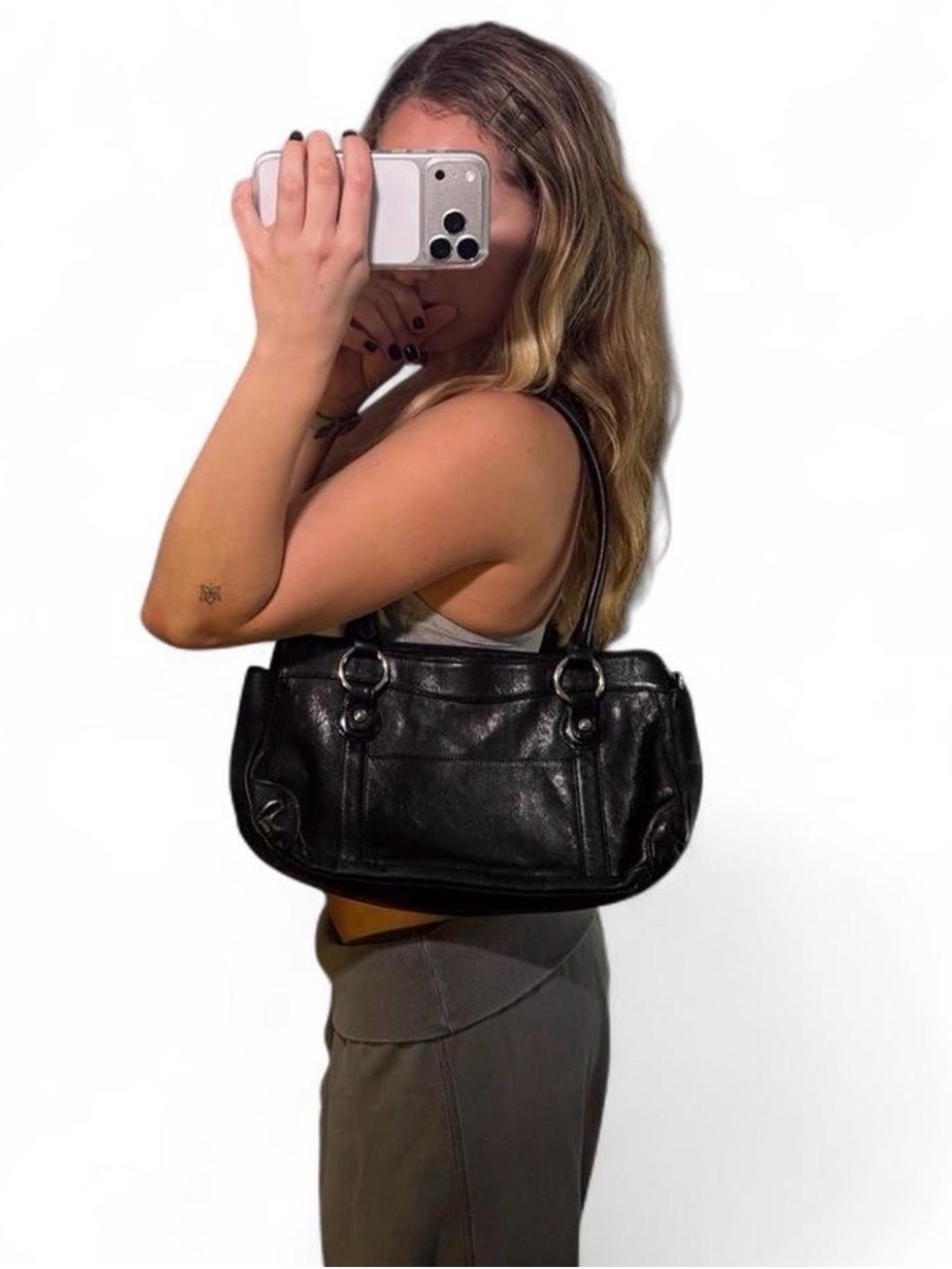 Black MAXX vegan leather handbag with silver hardware